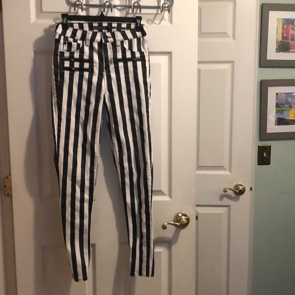Black and white striped. Blackheart Stingerette. Front zipper detail. Size 3.